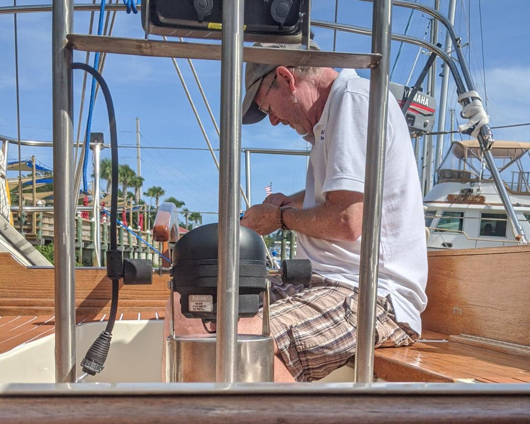 Franklin surveying a sailboat